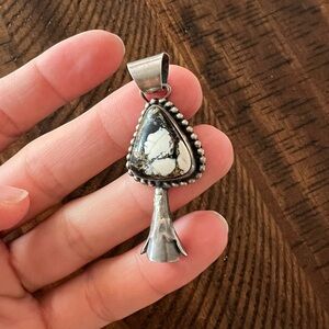 Genuine stamped White Buffalo pendant from Turquoise and Company